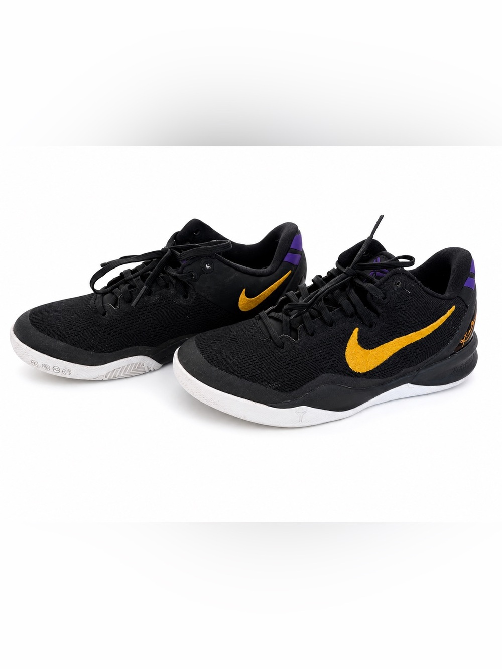 Nike Black Sneakers with Gold Swoosh and Purple Heel Accent